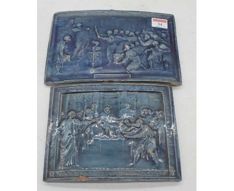 A near pair of 19th century blue glazed earthenware tiles, probably Dunmore, each decorated with figures within an interior s