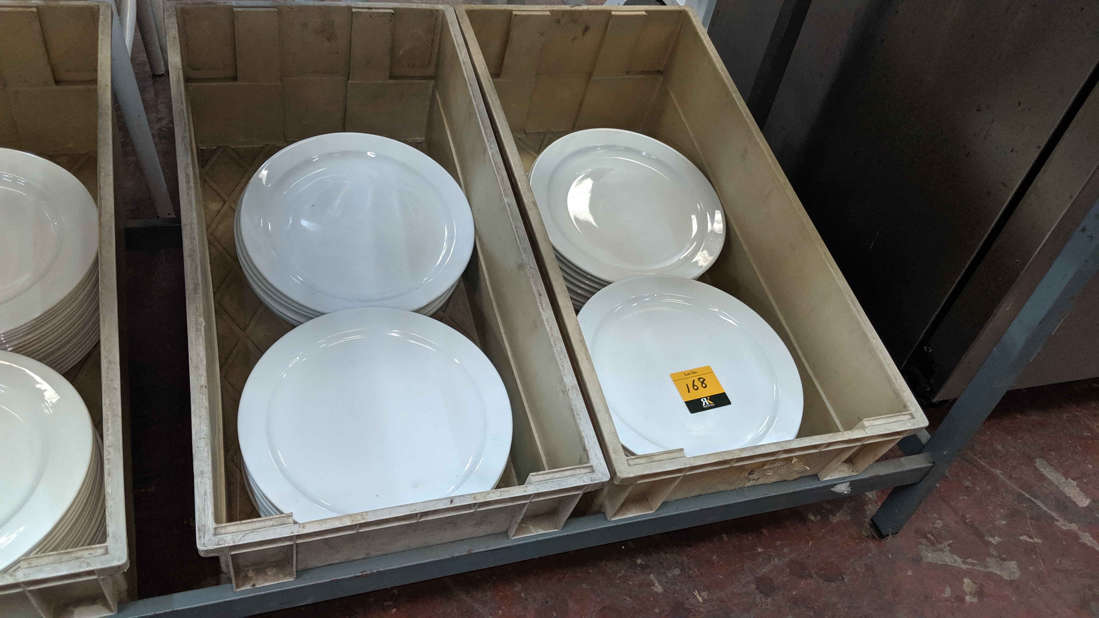 The contents of 4 crates of assorted white plates. NB crates excluded