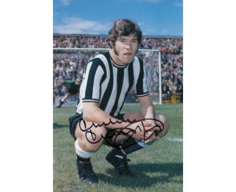 Autographed MALCOLM MacDONALD 12 x 8 photo : Col, depicting Newcastle United centre-forward MALCOLM MacDONALD striking a full