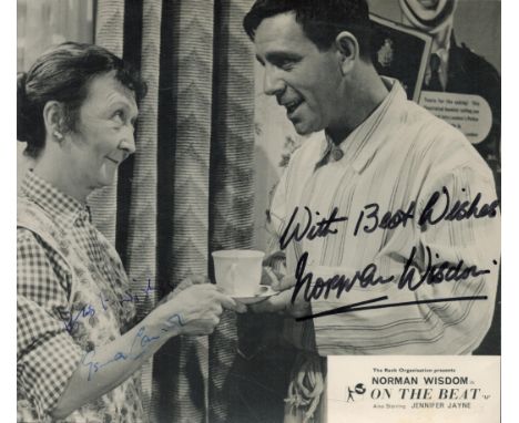 Esma Cannon and Norman Wisdom signed 8x6 inch On the Beat vintage black and white promo photo. Good condition. All autographs