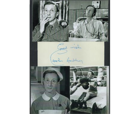 Charles Hawtrey 12x8 inch signature piece includes signed white card and four vintage black and white photos attached to blac