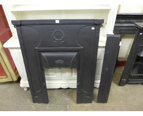 An Edward VII cast iron surround