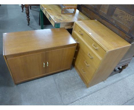 An E. Gomme, G-Plan light oak chest of drawers and teak record cabinet