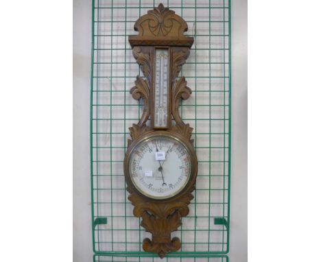 An early 20th Century R. Osmond of Leicester oak aneroid barometer