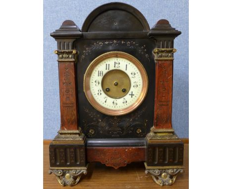 A 19th Century French Belge noir and rouge marble mantel clock