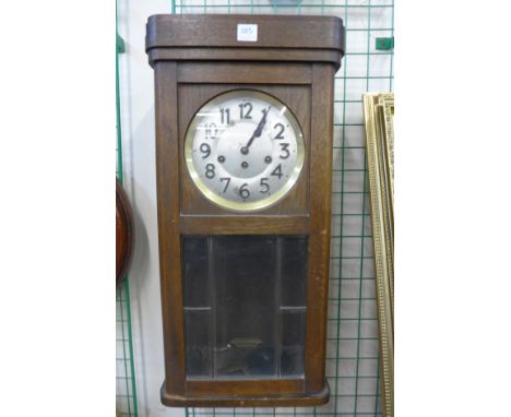 An oak wall clock