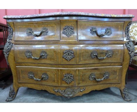A French Louis XV style ormolu mounted rosewood bombe commode