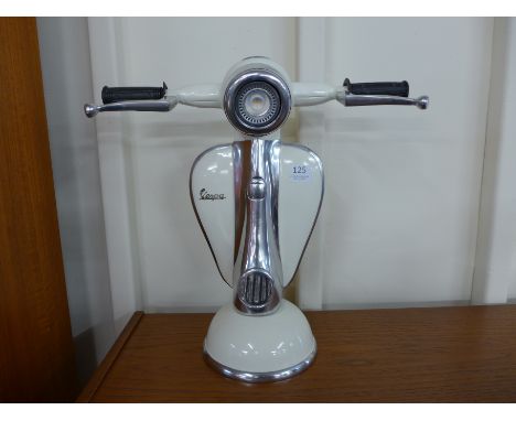 A cream Vespa table lamp