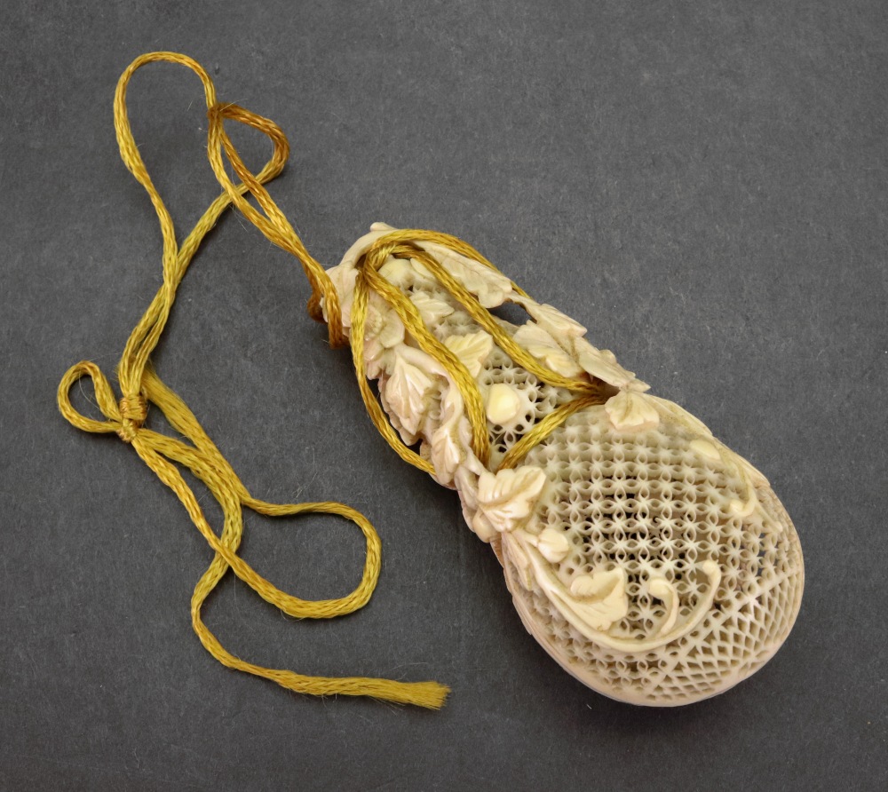 A Canton ivory gourd shaped cricket cage, late 19th century, carved in