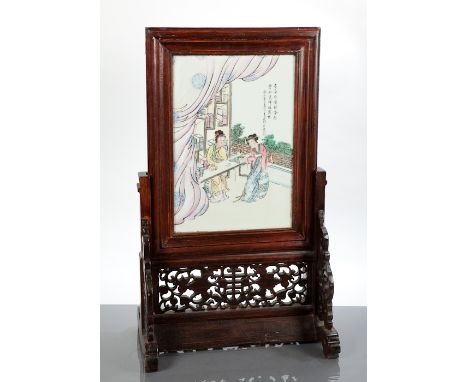 CHINESE CERAMIC TABLE SCREEN IN STAND the plaque with female figures, named Wang Da Fang,  in carved wooden stand, 65cm high 
