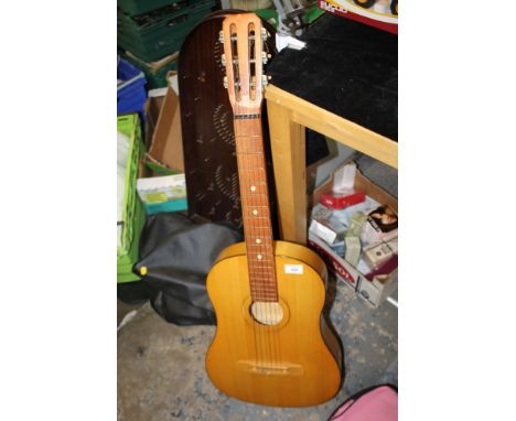 A VINTAGE ACOUSTIC GUITAR