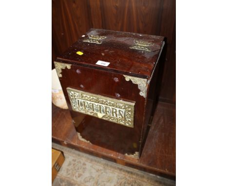 A VINTAGE MAHOGANY AND BRASS LETTER BOX