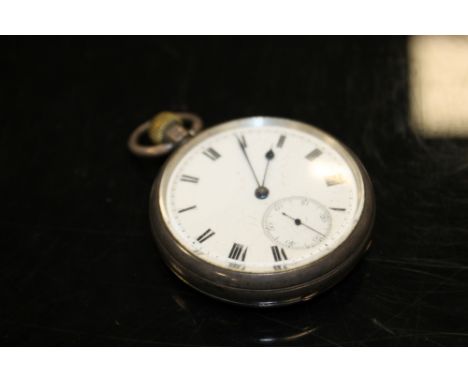 A HALLMARKED SILVER OPEN FACE MANUAL WIND POCKET WATCH