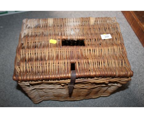A VINTAGE WICKER FISHING BOX
