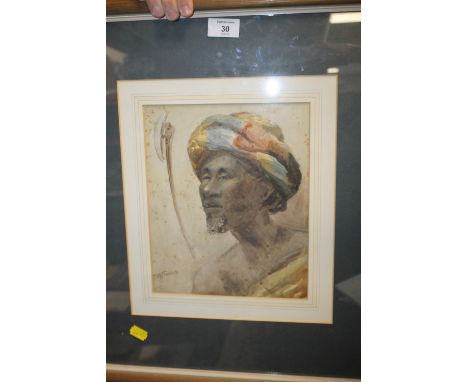 AN INDISTINCTLY SIGN FRAMED AND GLAZED WATERCOLOUR PORTRAIT OF A NORTH AFRICAN GENTLEMAN