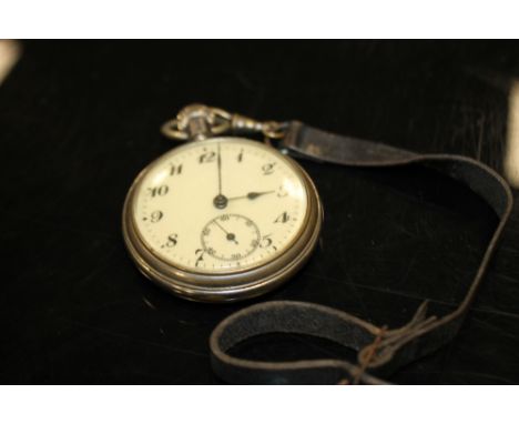 A VINTAGE GENTS POCKET WATCH ON LEATHER STRAP