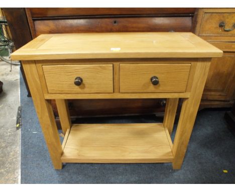 A MODERN LIGHT OAK TWO DRAWER CONSOLE TABLE W 85 CM