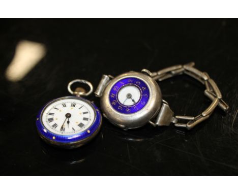 A LADIES VINTAGE SILVER AND ENAMEL WRISTWATCH TOGETHER WITH A SILVER AND ENAMEL FOB WATCH