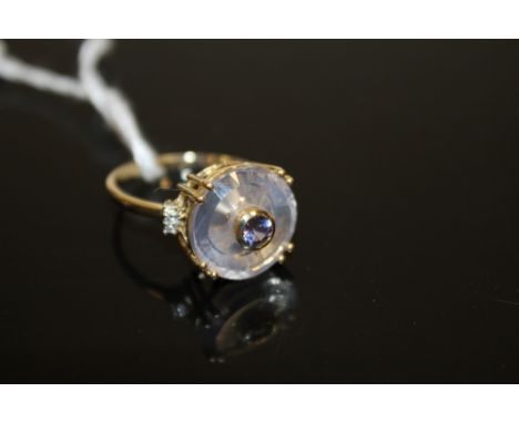 A HALLMARKED 9K GOLD LAVENDER QUARTZ TANZANITE AND DIAMOND RING,  the lavender quartz is approx 6.02 carats measuring 14 mm x