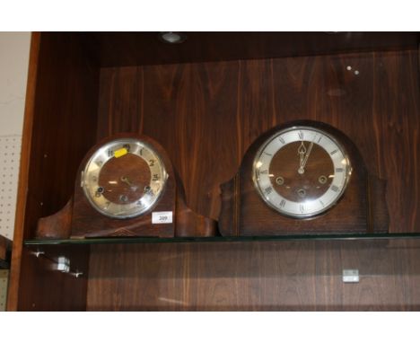 TWO VINTAGE OAK MANTEL CLOCKS