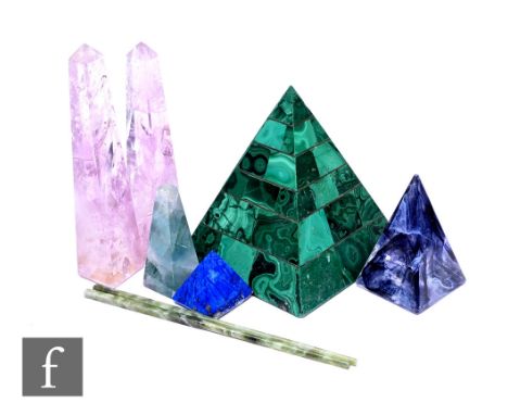 A large sectional malachite pyramid paperweight, height 16cm, a similar lapis lazuli example, a pair of amethyst obelisks and
