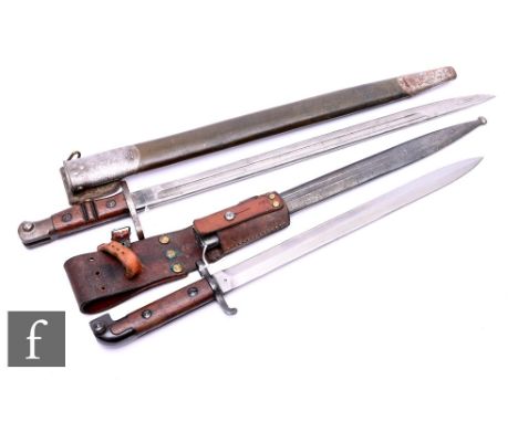 A World War One US Remington bayonet and part leather scabbard, blade 43cm, and a Swedish double edge bayonet for Mauser mode