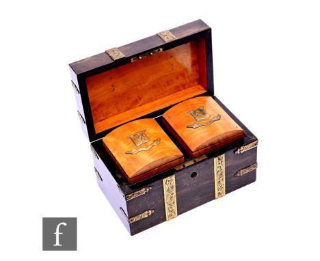 A 19th century coromandle tea caddy, the hinged cover opening to reveal two satinwood cannisters, with engraved gilt metal mo