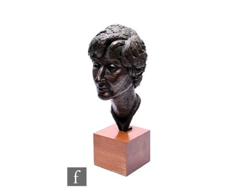 A mid 20th Century bronze portrait bust of a lady, attached to a teak plinth base, overall height 53cm. Condition reports for