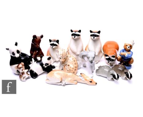 A collection of Lomonosov and other porcelain animals, to include raccoons, pandas, bears, and a collection of Lomonosov mini