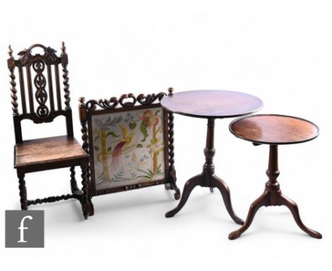 A 19th Century circular oak tripod occasional table on splayed legs, diameter 62cm, and a similar smaller tripod occasional t