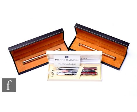 A Dupont fountain pen, a similar biro and a pen set by Pierre Balmain, all cased. (3) Condition reports for each lot are avai