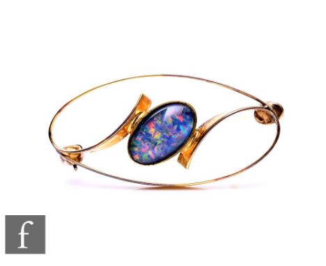 A boxed gold on silver single stone opal brooch. Condition reports for each lot are available on our website.