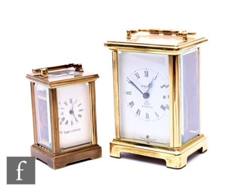 A 20th Century brass miniature carriage clock by Mappin &amp; Webb, height 8cm, and a later brass carriage clock by Bayard Wo