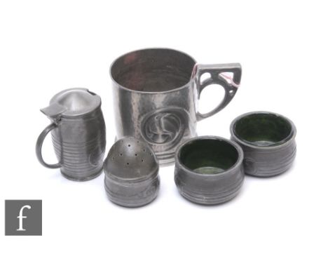 An early 20th Century&nbsp;Archibald Knox for Liberty &amp; Co. pewter cruet set, comprising two salts with green glass liner