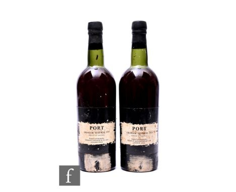 Two bottles of Graham's 1955 Vintage Port, Charles Kinloch Label. (2) Condition reports for each lot are available on our web