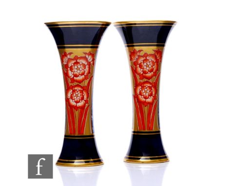 A pair of early 20th Century Macintyre &amp; Co Aurelian pattern vases, of trumpet form, burnt red enamelled floral panels ov