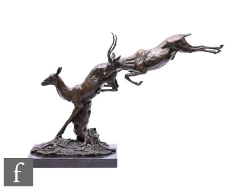 A late 19th Century&nbsp;Russian bronze leaping deer by E. Nahcepe, on marble base, signed in the cast, height 42cm. Conditio