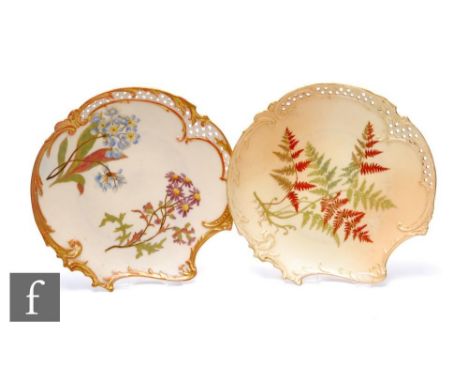 Two Royal Worcester blush ivory Empress dessert plates, circa 1891, of asymmetric form with reticulated borders, decorated wi