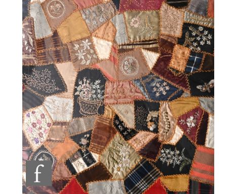 A 19th Century collage patchwork needlework sampler, embroidered with flowers and dated 1890, framed 49cm x 48cm. Condition r