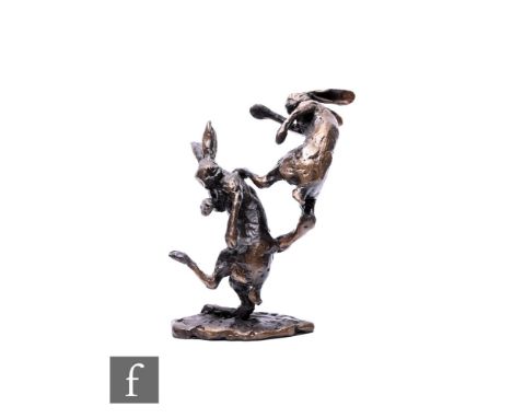 A late 20th Century bronze sculpture, Boxing Hares, by&nbsp;Paul Jenkins, impressed marks, height 10cm. Condition reports for