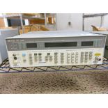 HP Model 8657B .01 - 2060MHz Signal Generator