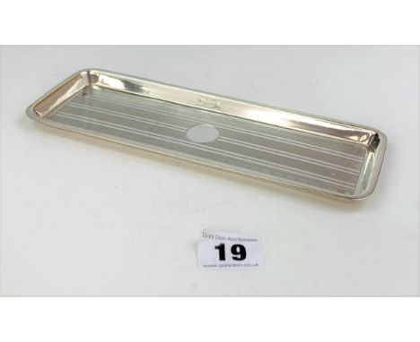 Silver tray 9” long x 3” wide. W: 3.4 ozt