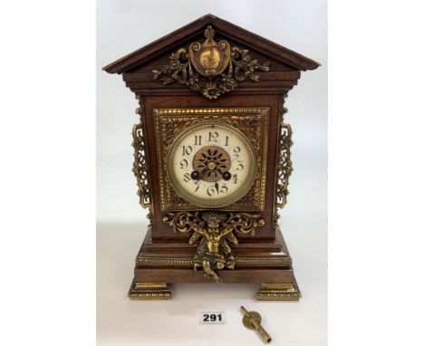 Mahogany Mantle Clock With Brass Mounts And Decorations In The French Style With Original Watchmakers Label. 13" High X 9" Lo