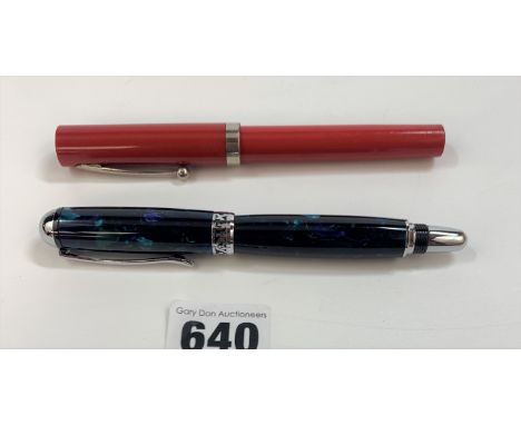Blue/green roller ball pen and a red Sheaffer roller ball pen