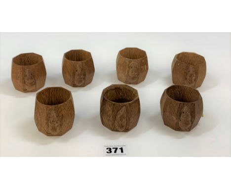 7 Mouseman napkin rings 2” high