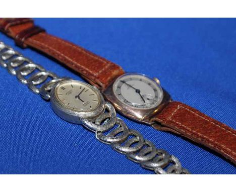 GENTLEMAN'S RECORD GOLD CASED WRIST WATCH
on brown leather strap; along with a rotary wrist watch