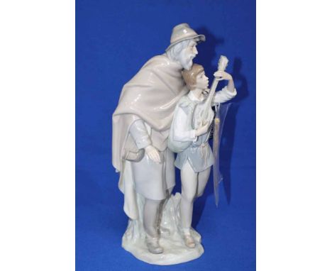 LARGE LLARDO FIGURE
of an old man guiding a boy playing a lute, 36cm high