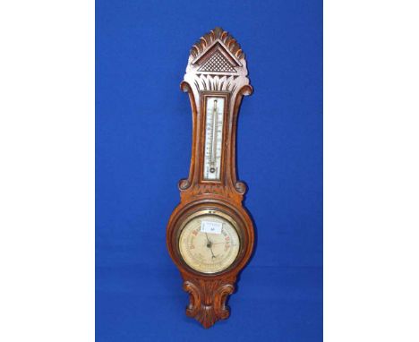 VICTORIAN CARVED OAK ANEROID WALL BAROMETER
60cm high