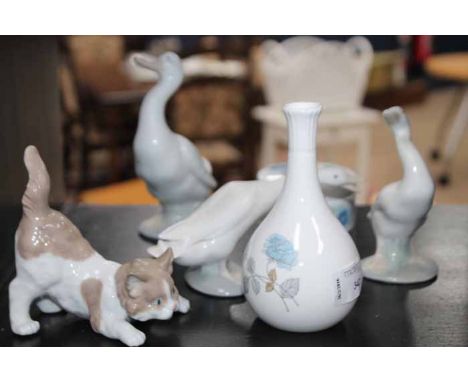 LOT OF LLADRO SWANS 
along with a Nao figure example and a cat 