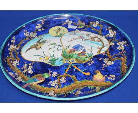 LATE 19TH/EARLY 20TH CENTURY MINTON CERAMIC PLAQUE
painted with bird and foliate decoration, 51cm diameter (cracked in half a
